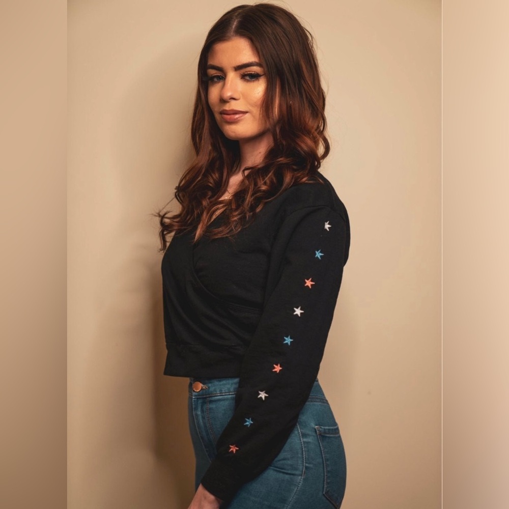 Le Lis Embellished Stars Long Sleeve Faux Wrap V-Neck Crop Sweatshirt in Black